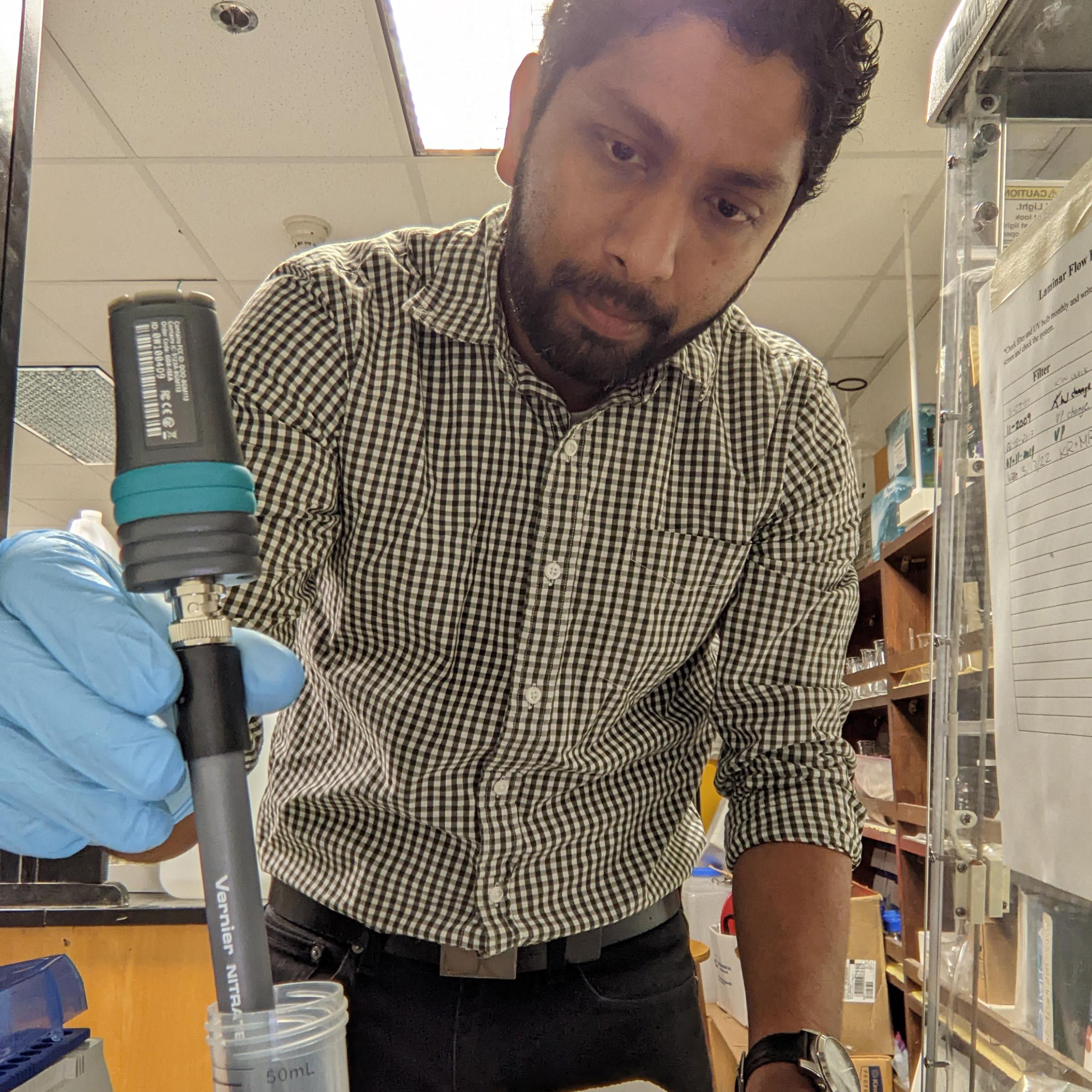 Varun Paul, PhD, holding a Go Direct Nitrate Ion-Selective Electrode
